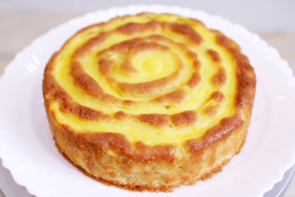 Orangenkuchen, der luftigste und unwiderstehlichste Kuchen mit einer originellen Spirale aus Käsecreme